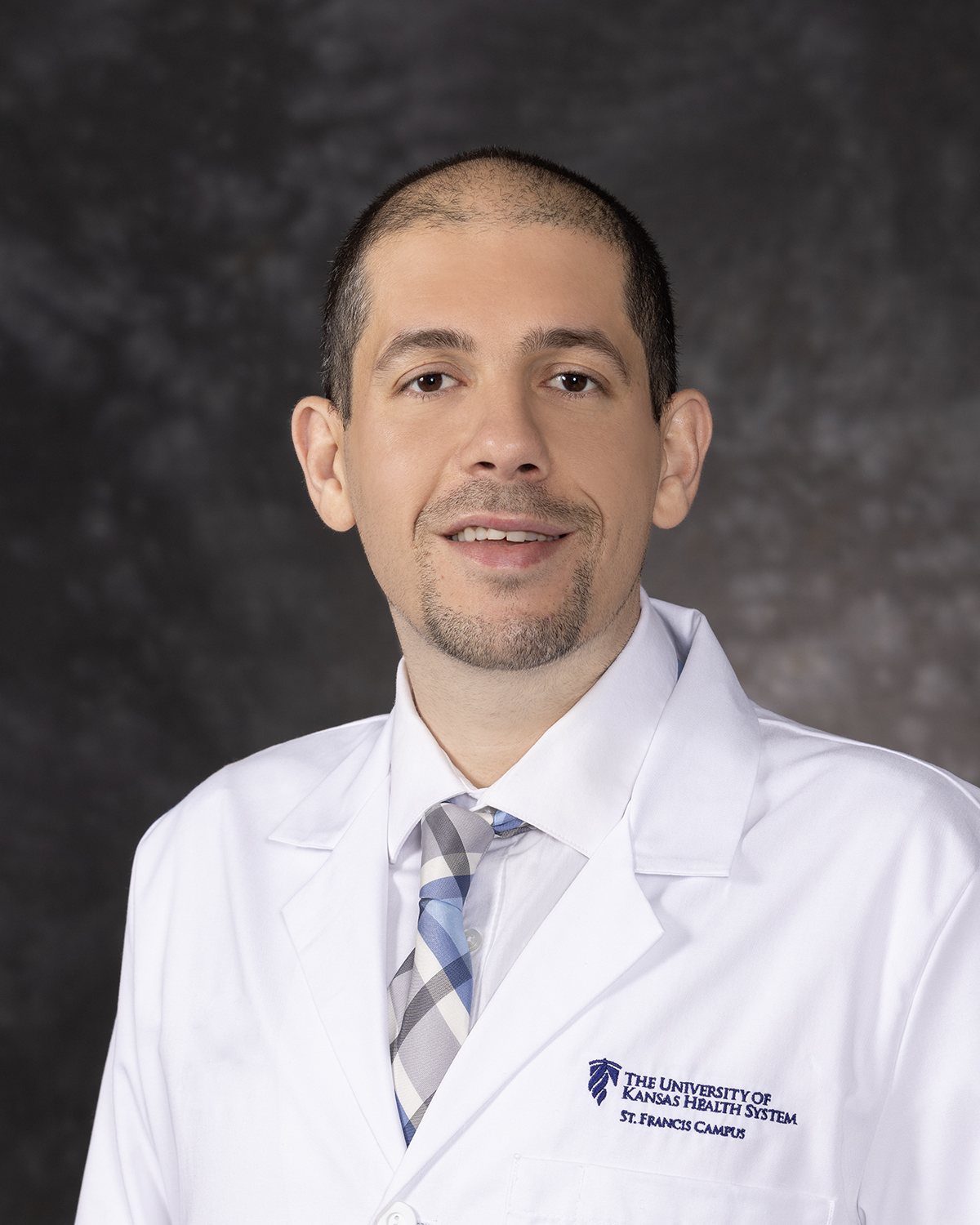 Omar Kousa, MD